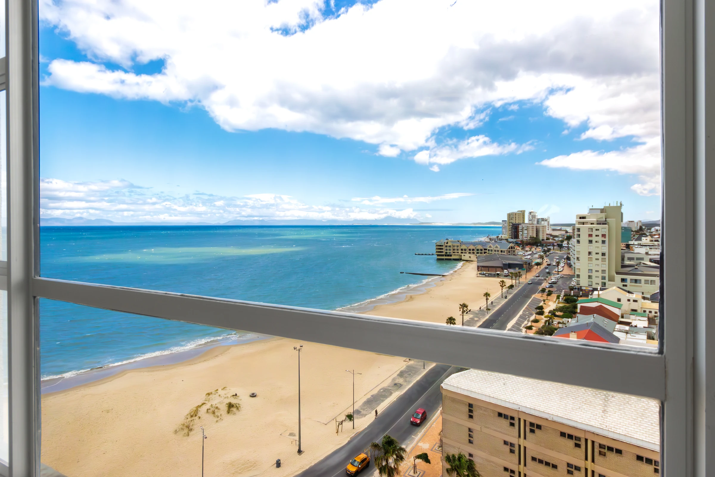 Elevated view of Strand Beach and False Bay from the eleventh floor
